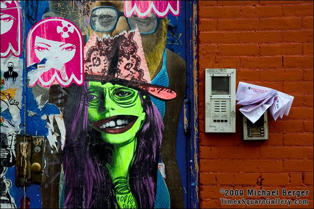 Door bell, door with posters, Crosby Street, NYC. 2008.
