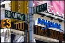 Street signs with 1 Times Square zipper sign. 2008.