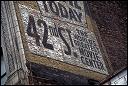 Sign painted on the side of a building on W. 42nd St. between 7th Ave. and 8th Ave. 1997.