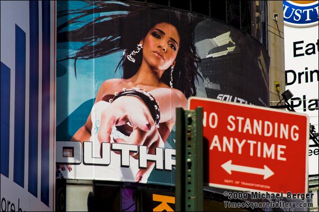 Times Square street sign and billboard. 2006.
