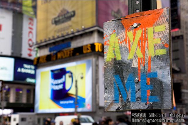 Hand made sign posted on W. 42nd St. and Broadway in Times Square. 2008.
