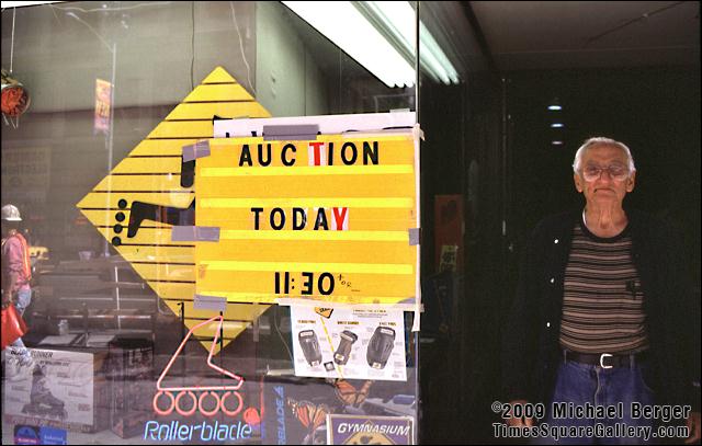 Auction at sporting goods store on 42nd St. between 6th Ave. and Broadway. Times Square. 1997.