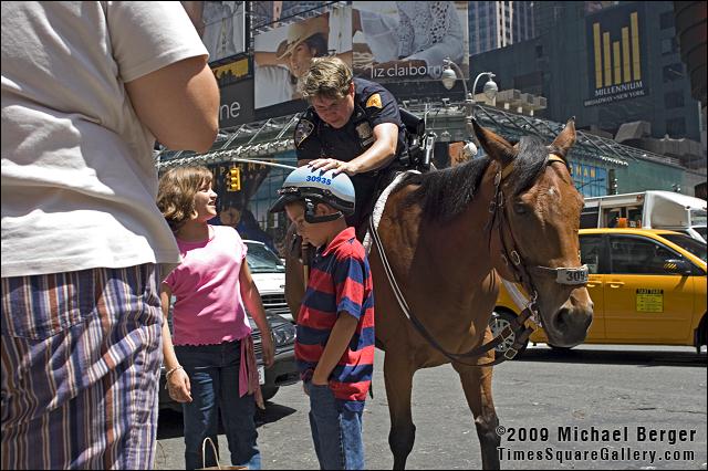 Mounted police officer, west side of 7th Ave. between 43rd St. and 44th St.. 2006.