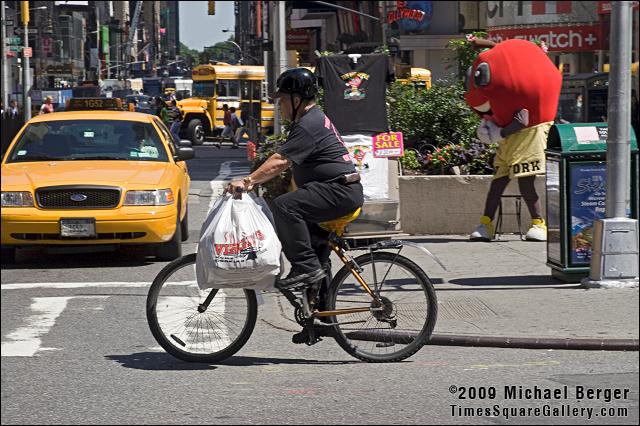 Food delivery man, NE corner of 44th St. and 7th Ave. 2006.